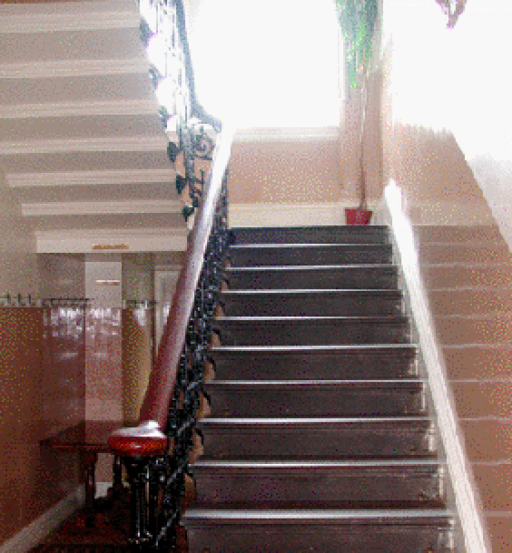 Mahogany and cast iron banister helped you up the wide stone stairs to the BACCApipes club room.